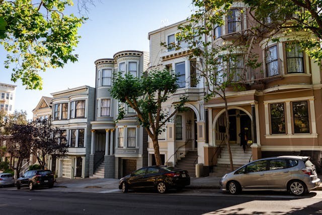 Cars parked in front of San Francisco's historic homes